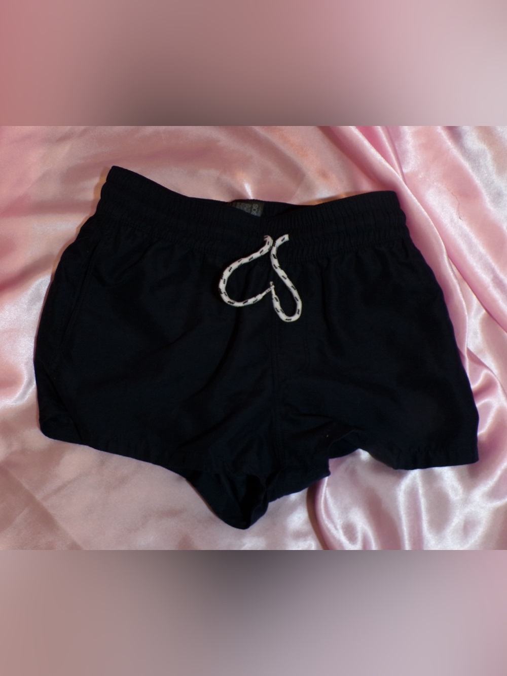 Men’s black swim shorts